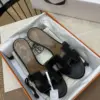 Sandales Hermès Oran en Cuir de Veau Box Noir img 001 133.webp