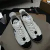 Chanel 26P Panda Sneakers - Lambskin and Deerskin img 001 85.webp